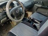 Mazda 323 2002 годаүшін2 200 000 тг. в Шымкент – фото 3