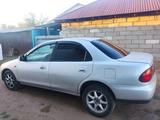 Mazda Familia 1996 годаүшін700 000 тг. в Аксу – фото 3