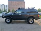 Toyota Land Cruiser 2005 года за 19 000 000 тг. в Астана – фото 2