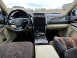 Toyota Camry 2015 года за 10 500 000 тг. в Актобе – фото 5