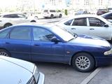 Mazda 626 1995 года за 1 400 000 тг. в Астана – фото 2