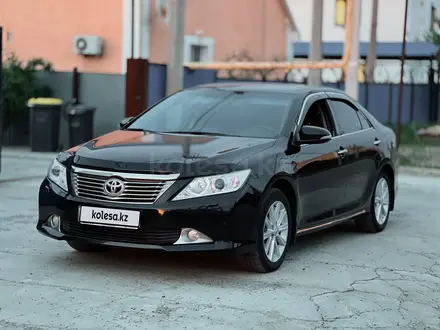 Toyota Camry 2013 года за 12 600 000 тг. в Атырау