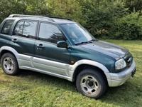 Suzuki Grand Vitara 1998 годаүшін2 700 000 тг. в Алматы