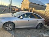 Chevrolet Cruze 2010 года за 2 000 000 тг. в Атырау – фото 4