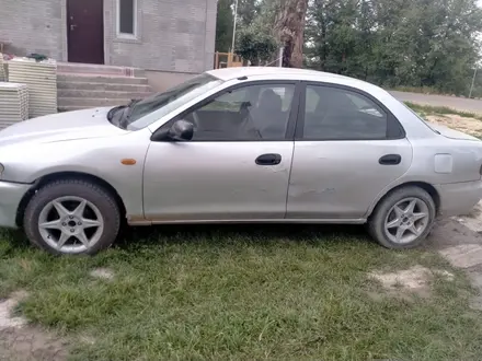 Mazda 323 1996 года за 350 000 тг. в Алматы – фото 3