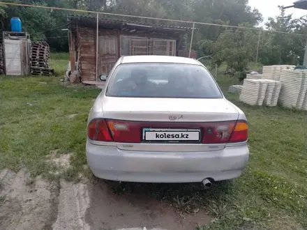 Mazda 323 1996 года за 350 000 тг. в Алматы – фото 4