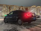 Skoda Rapid 2012 года за 2 900 000 тг. в Астана – фото 2