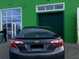 Toyota Camry 2013 годаүшін4 700 000 тг. в Актобе – фото 2