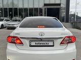 Toyota Corolla 2013 года за 7 190 000 тг. в Шымкент – фото 4
