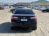 Toyota Camry 2014 года за 6 750 000 тг. в Атырау – фото 5