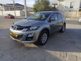 Mazda CX-7 2011 года за 5 200 000 тг. в Жанаозен