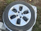 Резина с дисками и колпаками за 50 000 тг. в Астана