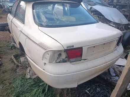 Mazda 626 кронус, запчасти по кузову за 1 000 тг. в Актобе