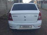 Renault Logan 2013 года за 2 300 000 тг. в Казыгурт