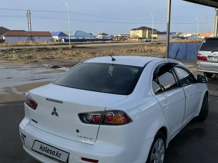 Mitsubishi Lancer 2013 года за 5 500 000 тг. в Атырау – фото 2