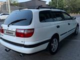 Toyota Carina E 1997 года за 2 500 000 тг. в Шымкент – фото 4