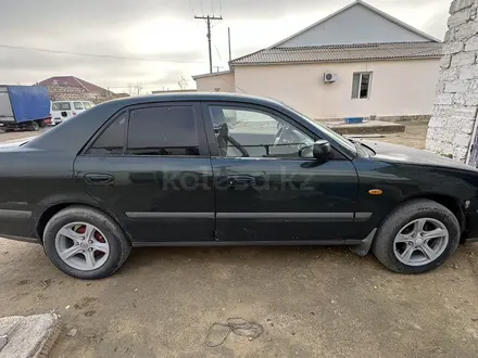 Mazda 626 1999 года за 2 300 000 тг. в Актау – фото 4