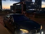 BMW 750 2010 года за 12 500 000 тг. в Астана – фото 2