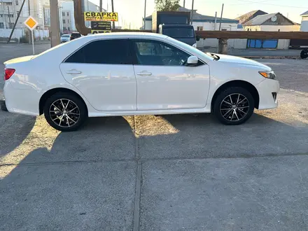 Toyota Camry 2014 года за 6 200 000 тг. в Атырау