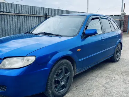 Mazda 323 2003 года за 1 300 000 тг. в Жанакорган – фото 12