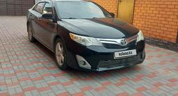 Toyota Camry 2013 года за 7 800 000 тг. в Актобе