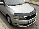 Skoda Rapid 2013 года за 4 100 000 тг. в Астана – фото 2