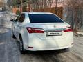 Toyota Corolla 2014 года за 6 900 000 тг. в Алматы – фото 13