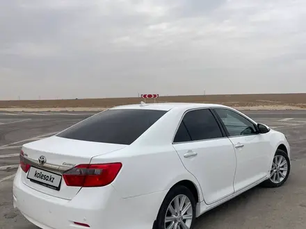 Toyota Camry 2013 года за 8 000 000 тг. в Жанаозен – фото 17