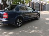 Mazda 323 2001 года за 1 580 000 тг. в Алматы – фото 4