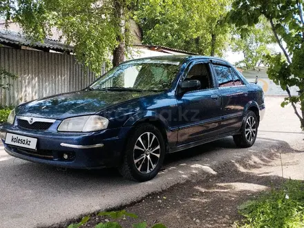 Mazda 323 2001 года за 1 580 000 тг. в Алматы – фото 3