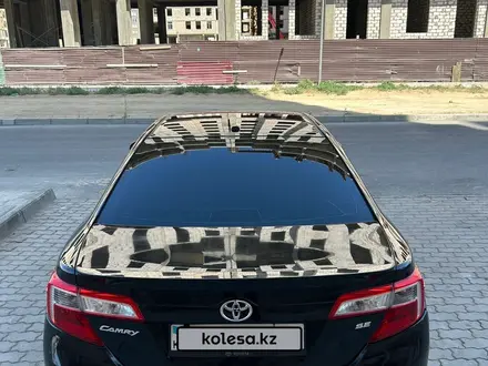 Toyota Camry 2013 года за 7 500 000 тг. в Жанаозен – фото 9
