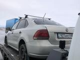 Volkswagen Polo 2012 года за 856 545 тг. в Караганда – фото 3