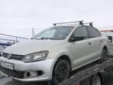 Volkswagen Polo 2012 года за 856 545 тг. в Караганда – фото 2