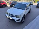 Mitsubishi L200 2014 годаүшін5 300 000 тг. в Астана – фото 2