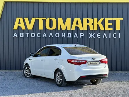 Kia Rio 2014 года за 4 850 000 тг. в Актобе – фото 4