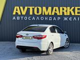 Kia Rio 2014 года за 4 850 000 тг. в Актобе – фото 3
