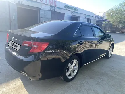 Toyota Camry 2014 года за 8 500 000 тг. в Жанаозен – фото 6