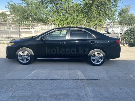 Toyota Camry 2014 года за 8 500 000 тг. в Жанаозен – фото 8