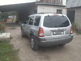 Mazda Tribute 2000 года за 3 300 000 тг. в Алматы – фото 4