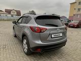 Mazda CX-5 2014 года за 9 500 000 тг. в Атырау – фото 4