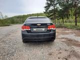Chevrolet Cruze 2013 года за 3 500 000 тг. в Черноярка – фото 5