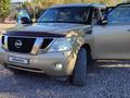 Nissan Patrol 2011 года за 11 500 000 тг. в Караганда – фото 2