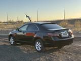 Toyota Camry 2010 года за 2 750 000 тг. в Караганда – фото 2