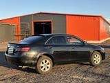Toyota Camry 2010 года за 2 750 000 тг. в Караганда – фото 3