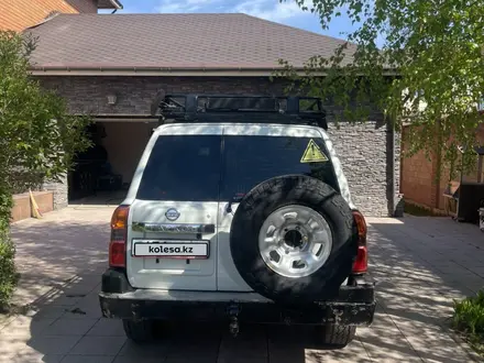 Nissan Patrol 2012 года за 17 500 000 тг. в Астана – фото 4