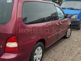 Kia Carnival 2001 года за 1 700 000 тг. в Шымкент – фото 3