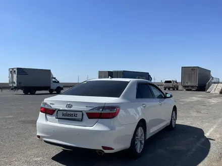 Toyota Camry 2015 года за 12 500 000 тг. в Атырау – фото 29