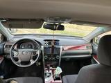 Toyota Camry 2014 года за 9 800 000 тг. в Астана