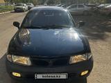 Mitsubishi Carisma 1997 годаүшін1 500 000 тг. в Тараз