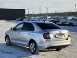 Skoda Rapid 2013 года за 3 200 000 тг. в Атырау – фото 4